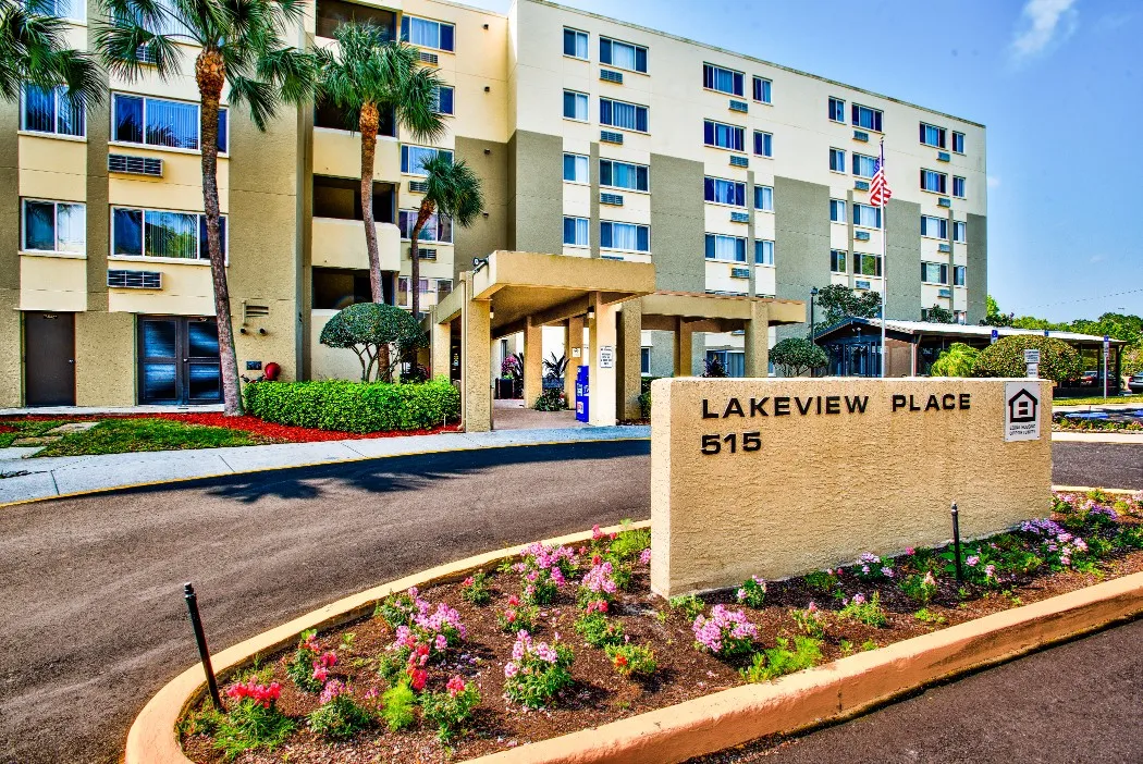 A view of the lakeview place sign and building in the background